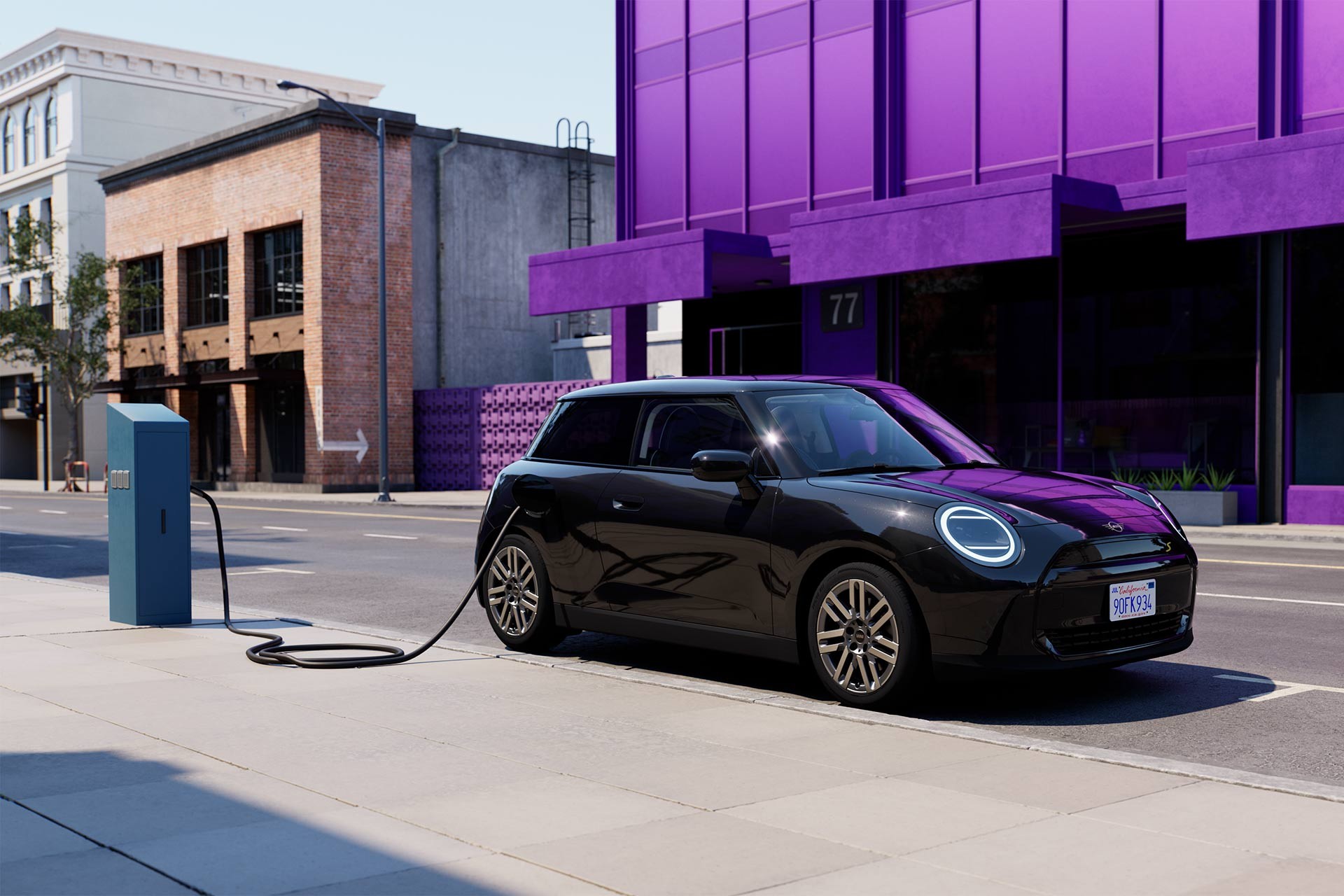 woman charging MINI Electric car